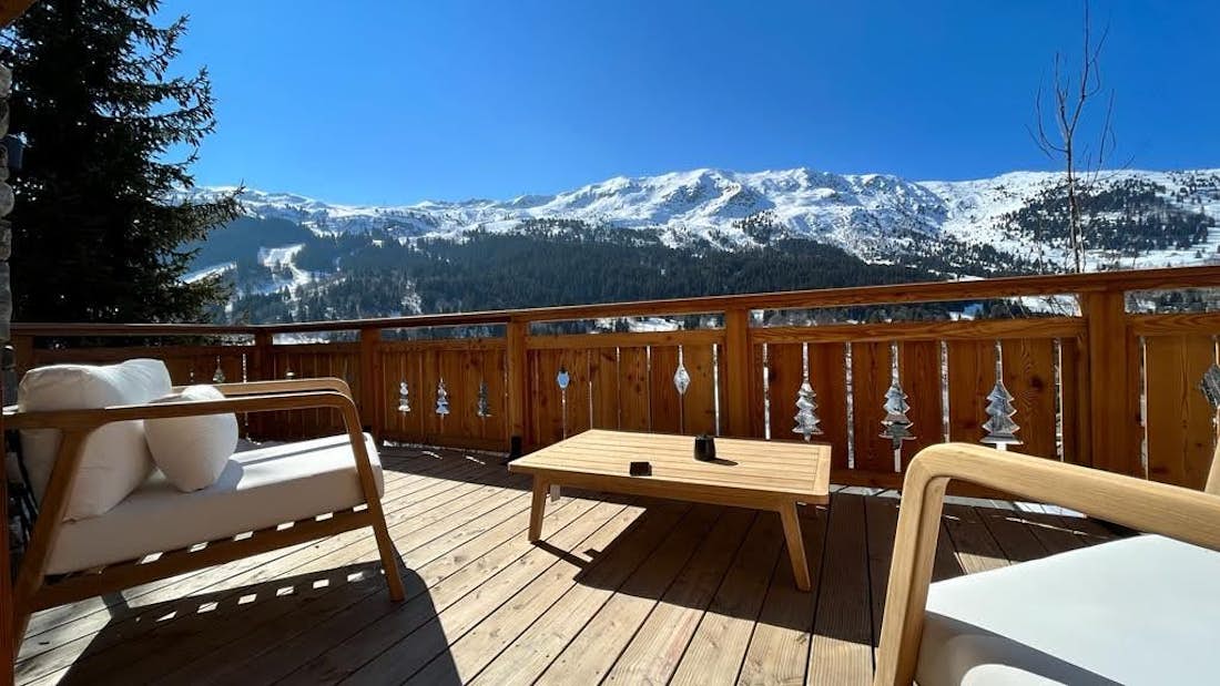 Large terrasse privée superbes vues panoramiques montagnes appartement de luxe aux pieds des pistes Ophite Méribel