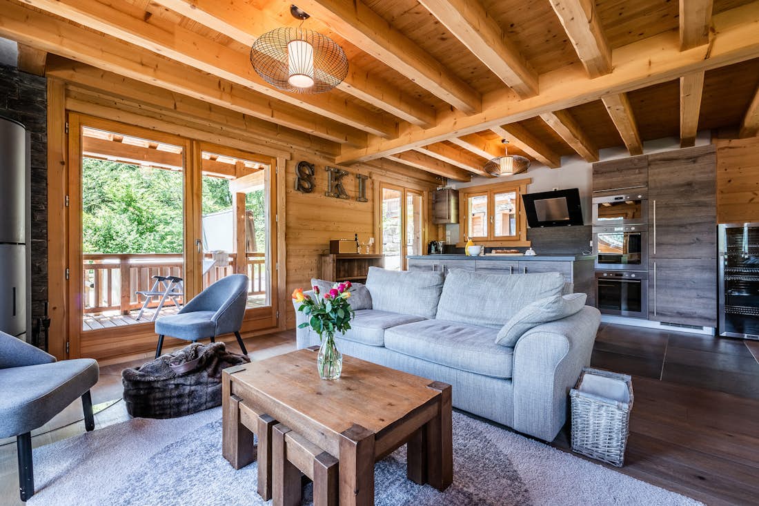 Morzine accommodation - Chalet Balata - Spacious living room with mountain views in luxury eco-friendly chalet Balata Morzine