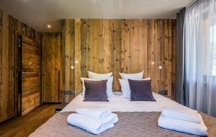 Les Gets accommodation - Chalet Moulin III - Cosy double bedroom ample cupboard space landscape views hot tub chalet Moulin 3 Les Gets