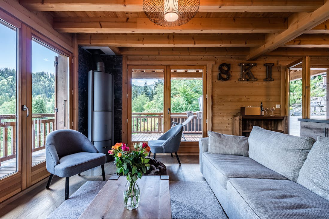 Morzine accommodation - Chalet Balata - Modern living room with large terrace in luxury eco-friendly chalet Balata Morzine