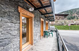 Wooden terrace mountain views Alps luxury ski apartment Ourson Morzine