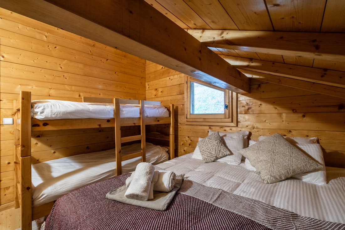 Morzine accommodation - Chalet Doux Abri - Cosy double bedroom and bunk beds at eco-friendly chalet Doux-Abri Morzine