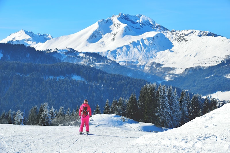 Woman on skiing holiday at French Alps.