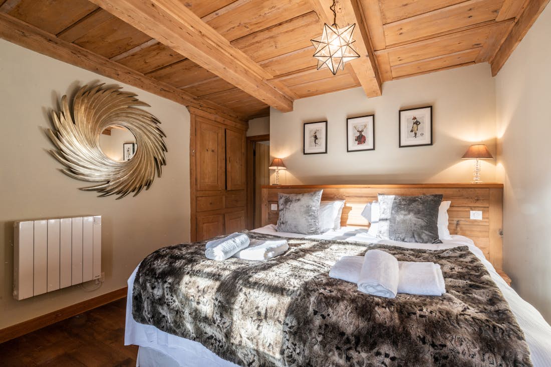 Modern double ensuite bedroom ski in ski out chalet La Ferme de Margot Morzine