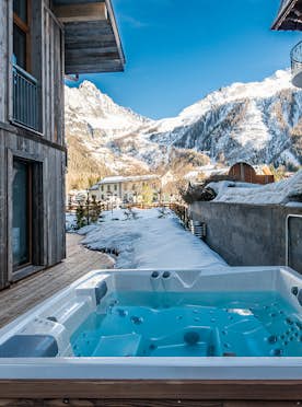 Luxury private hot tub with mountain views at Eyong apartment in Chamonix