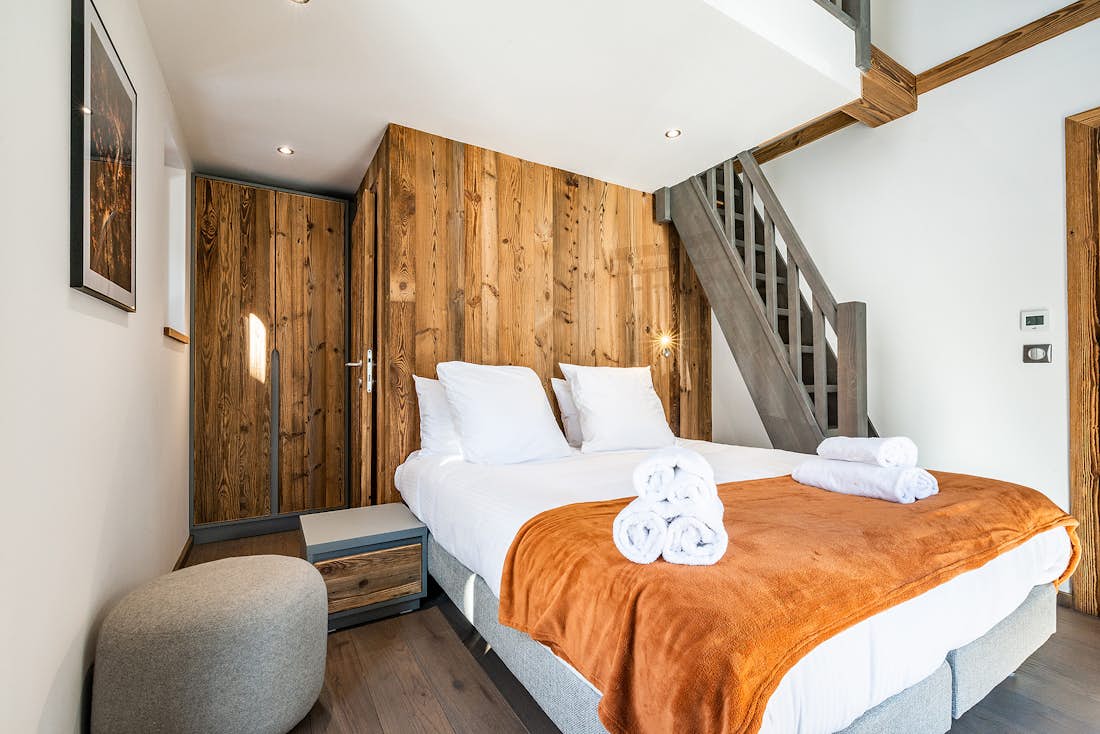 Duplex bedroom with wooden walls at Ravanel luxury accommodation in Chamonix