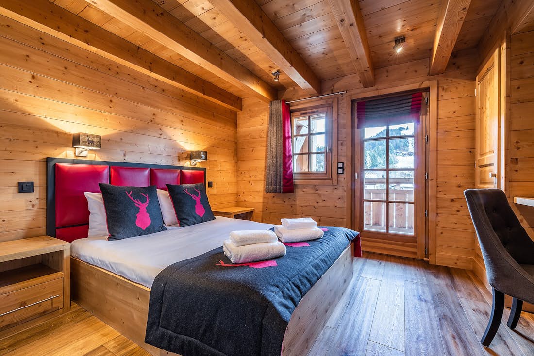 Cosy double bedroom ample cupboard space landscape views hotel services chalet Abachi Les Gets