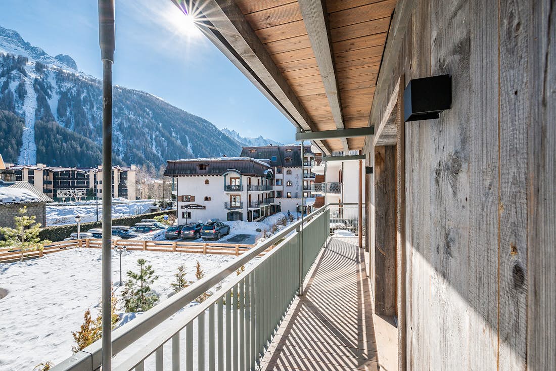 Chamonix accommodation - Apartment Ravanel - A wooden terrace with mountain views over the Alps at the luxury ski Chalet Ravanel in Chamonix