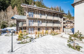 Exterior of Eyong accommodation in Chamonix with snow