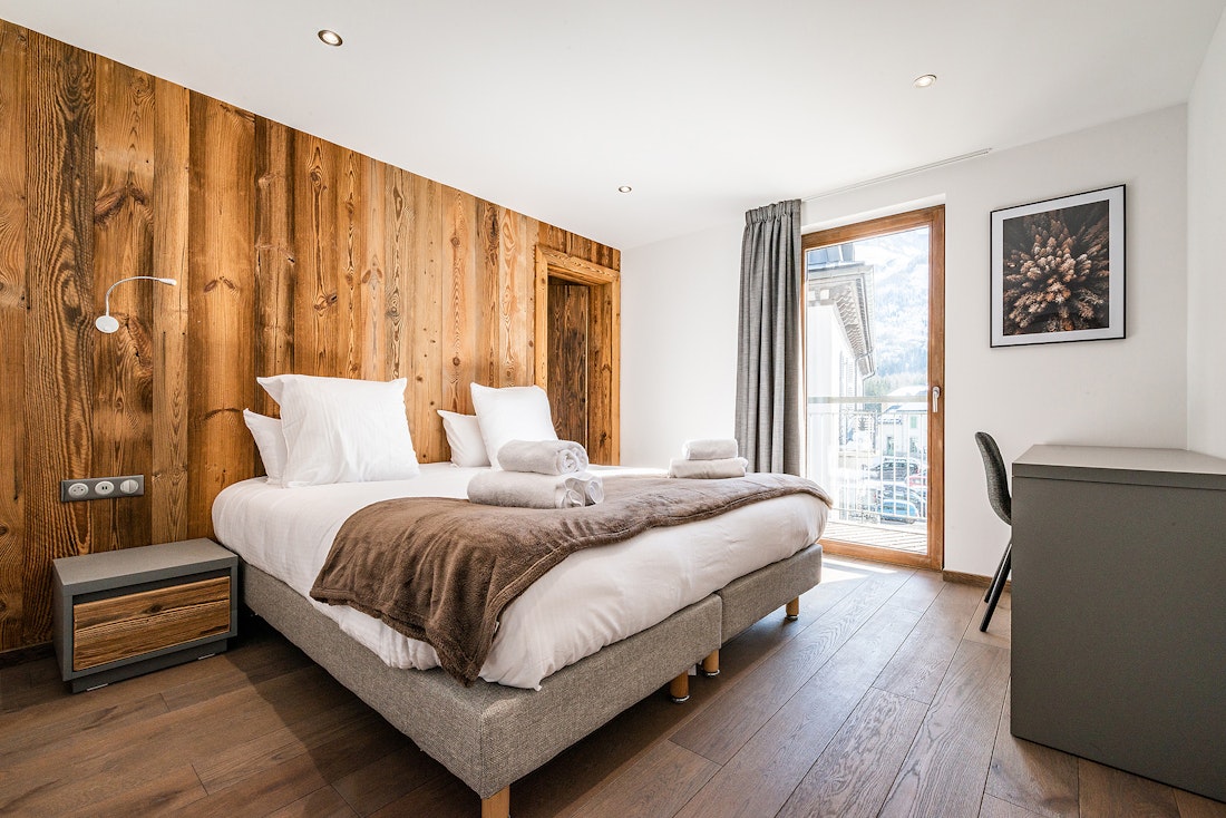 Double bedroom ensuite wooden walls Ruby luxury apartment Chamonix