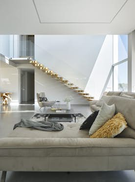 Costa Brava location - Villa Toi & Moi - A modern living room with a glass wall.