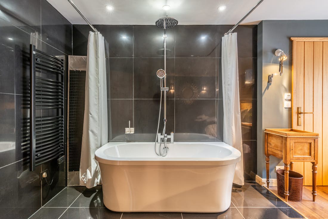 Cosy double bedroom walk-in shower eco-friendly chalet La Ferme de Margot Morzine