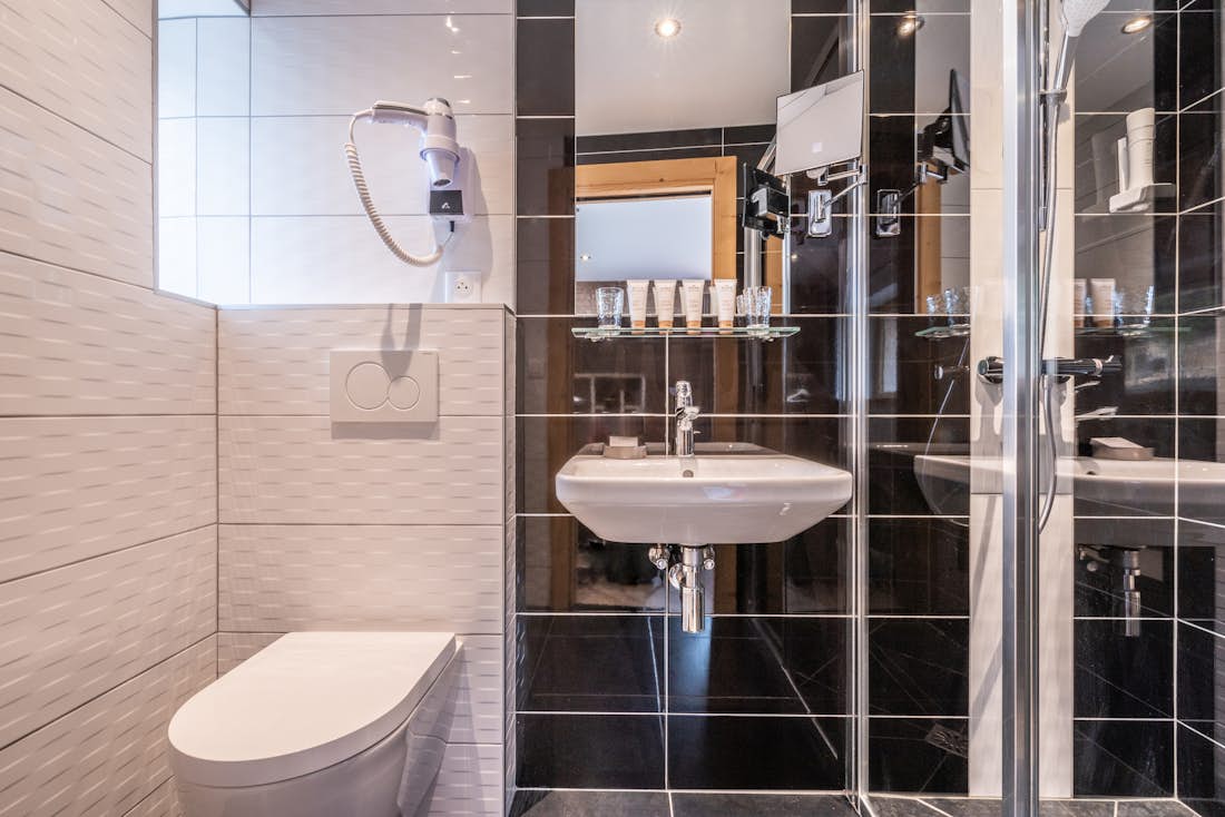 Modern bathroom walk-in shower hotel services apartment Flocon Morzine