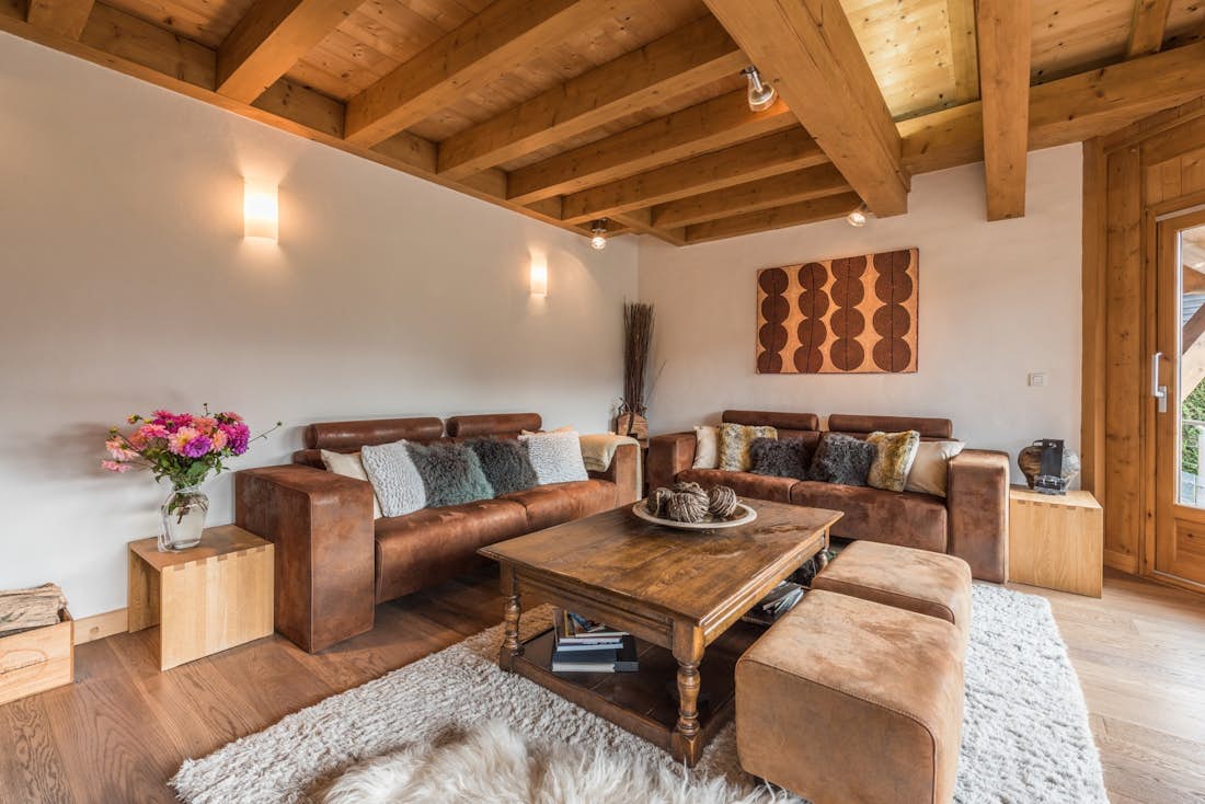 Contemporary living room leather couches luxury family chalet Omaroo I Morzine