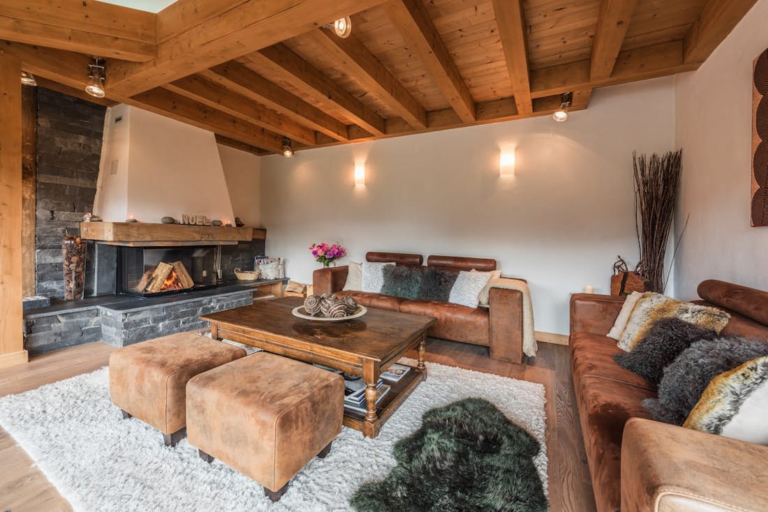 Spacious living room fireplace luxury family chalet Omaroo I Morzine