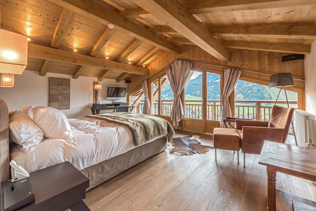 Cosy double bedroom landscape views hotel services chalet Omaroo I Morzine