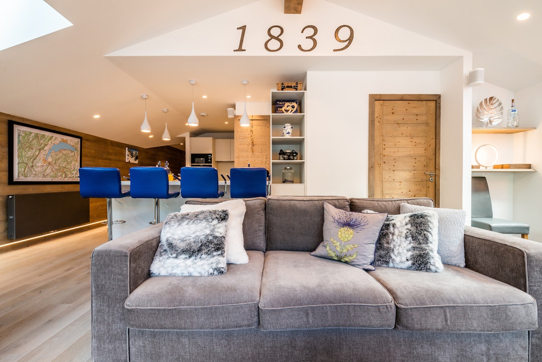 Cosy living room large sofas luxury family apartment Ozigo Les Gets