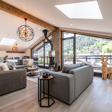 Alpine living room large balcony luxury family apartment Ozigo Les Gets