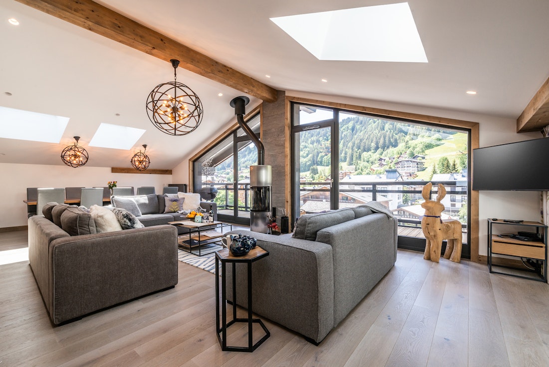 Alpine living room large balcony luxury family apartment Ozigo Les Gets