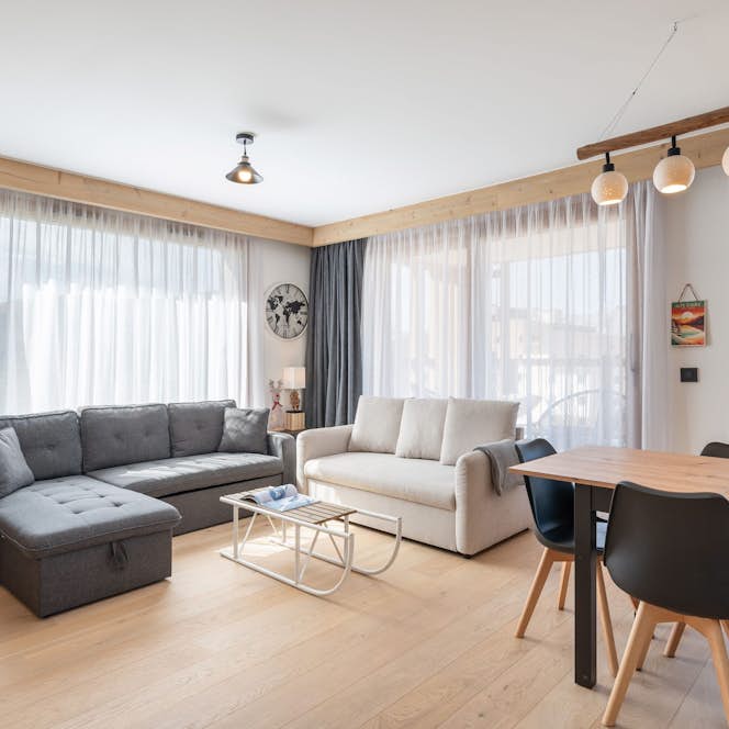 Alpe d’Huez location - Appartement Vallejo - Un salon spacieux dans appartement de luxe Fagus aux pieds des pistes à Alpe d'Huez Alpe d’Huez location - Appartement Vallejo - Ssalon spacieux appartement de luxe Fagus pieds des pistes Alpe d'Huez