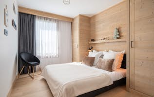 Alpe d’Huez location - Appartement Vallejo - Un salon spacieux dans appartement de luxe Fagus aux pieds des pistes à Alpe d'Huez Alpe d’Huez location - Appartement Vallejo - Ssalon spacieux appartement de luxe Fagus pieds des pistes Alpe d'Huez