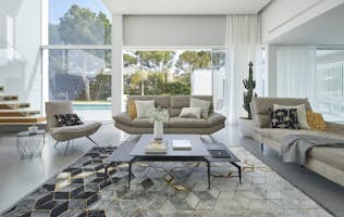 Costa Brava location - Villa Toi & Moi - A modern living room with a glass wall.