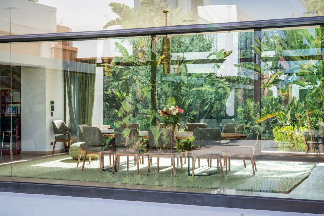 Contemporary living room with jungle garden view at Zagora private villa in Marrakech