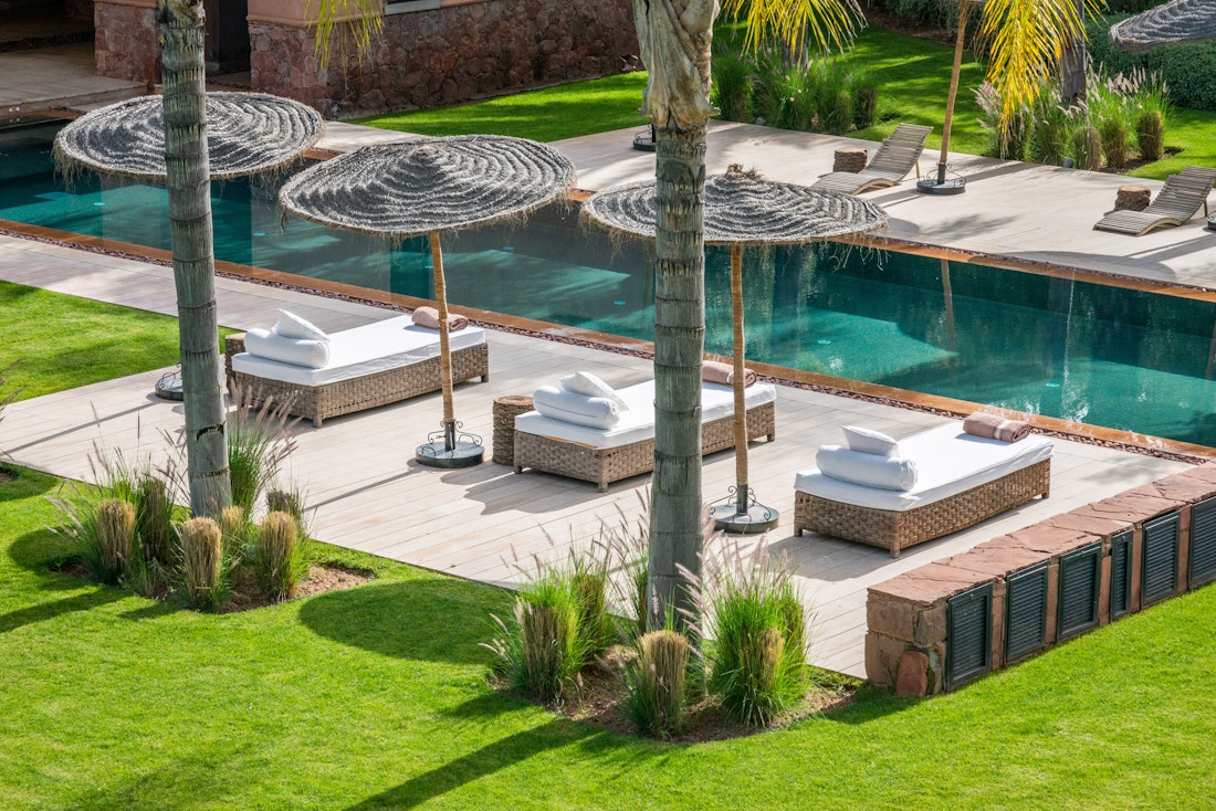 Private pool and raffia sun beds at Zagora private villa in Marrakech