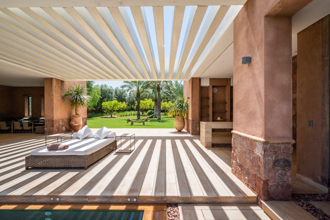 Outdoor raffia daybed at Zagora private villa in Marrakech