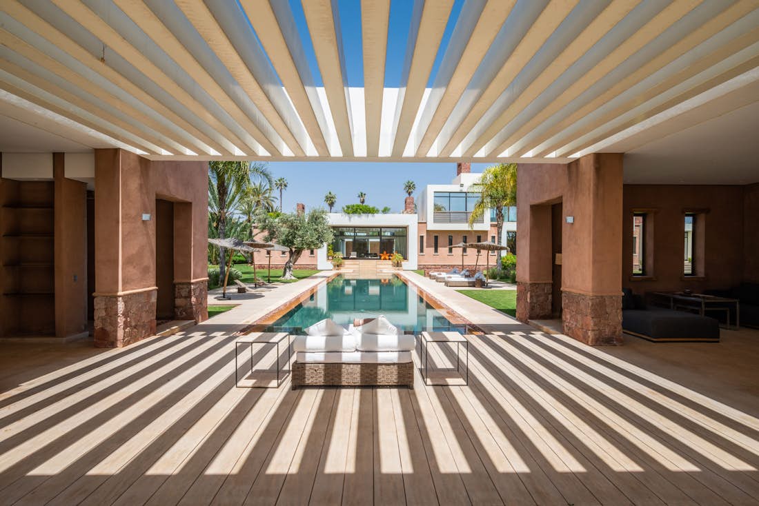 Design patio area with swimming pool view at Zagora private villa in Marrakech