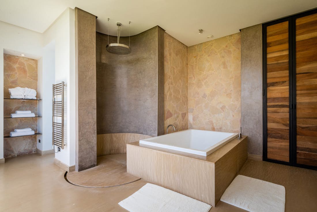 Industrial bathroom with rain shower at Zagora private villa in Marrakech
