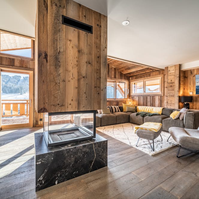 Costa Brava alojamiento - Chalet Floquet de Neu - Spacious alpine living room mountain views chalet Floquet de Neu Les Gets