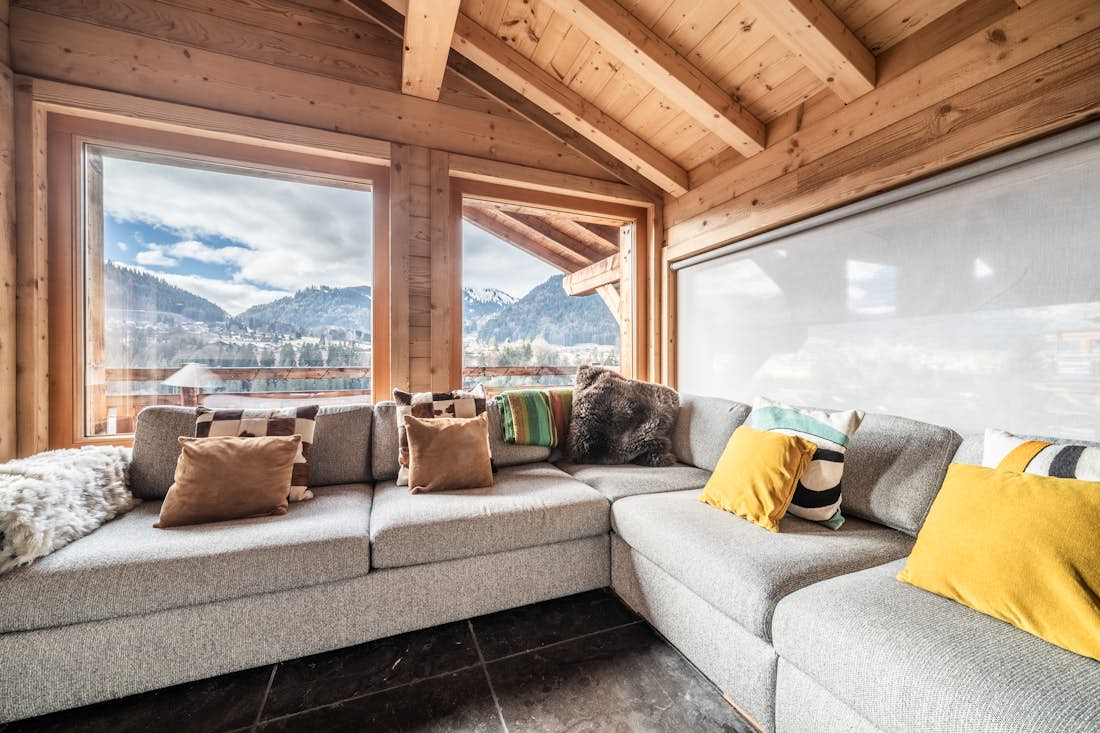 Morzine accommodation - Chalet Heavenly - Living room with mountain views family in Chalet Hellebore Montriond