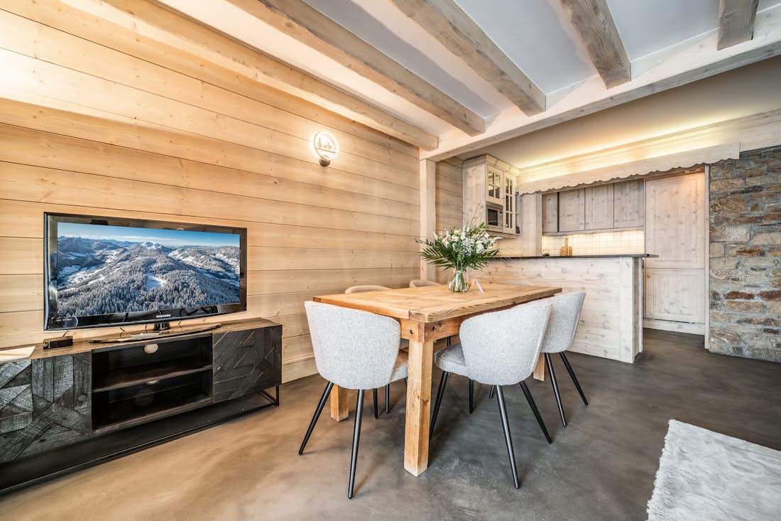 Courchevel accommodation - Apartment Mirador 1850 B - Bright open plan dining room with landscape views in ski in ski out apartment Mirador 1850 B Courchevel 1850