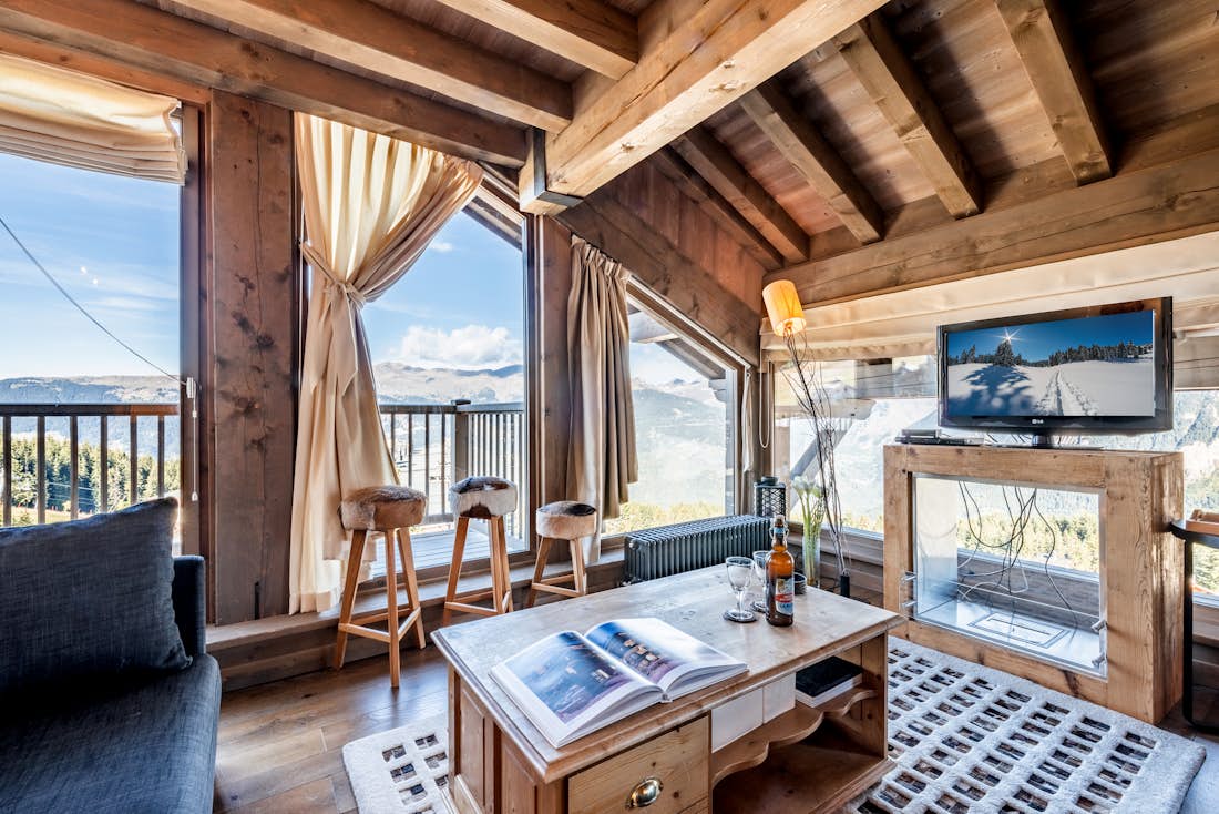 Bright alpine living room luxury ski in ski out apartment Tiama Courchevel 1850