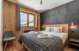 Chambre double moderne salle de bain appartement Fagus Alpe d'Huez