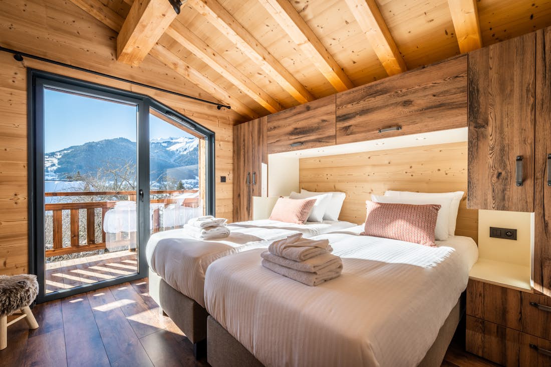Morzine accommodation - Chalet Azobe - Bright bedroom with landscape views for kids in family Chalet Azobe Morzine