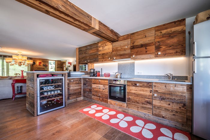 Open plan luxury kitchen ski in ski out apartment Moabi Courchevel Le Praz