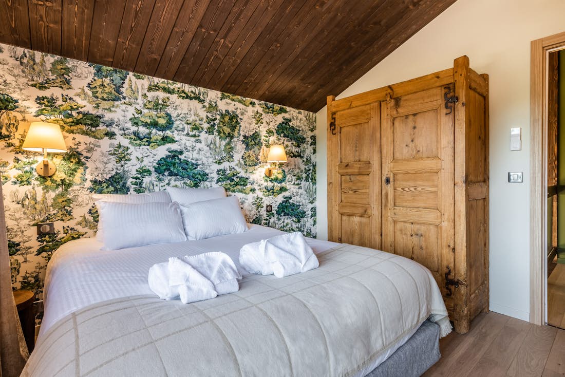 Morzine accommodation - Chalet Cipolin - Cosy double bedroom with landscape views at ski chalet Cipolin La Cote d'Arbroz