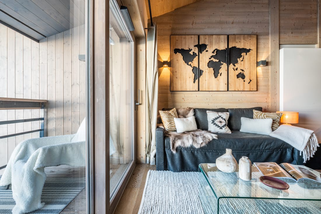 Spacious alpine living room outdoor views ski in ski out apartment Adda Courchevel Village