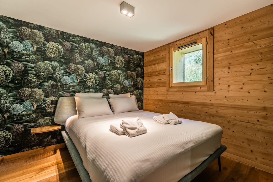 Chambre double confortable vue paysage appartement de luxe Tahoe ski Les Gets