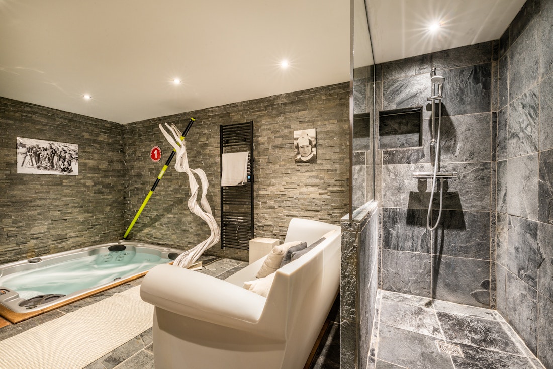 Beautiful wellness area sofa walk-in shower luxury apartment Moabi Courchevel le Praz