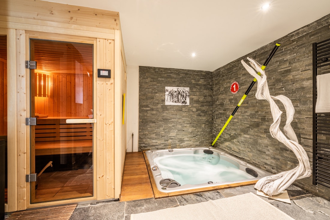 Luxury sauna hot tub wellness area ski in ski out apartment Moabi Courchevel Le Praz