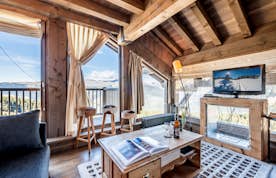 Cosy alpine living room luxury family apartment Tiama Courchevel 1850