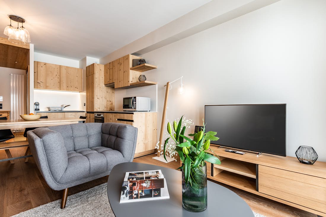 Salon cosy appartement de luxe aux pieds des pistes Thuja Alpe d'Huez