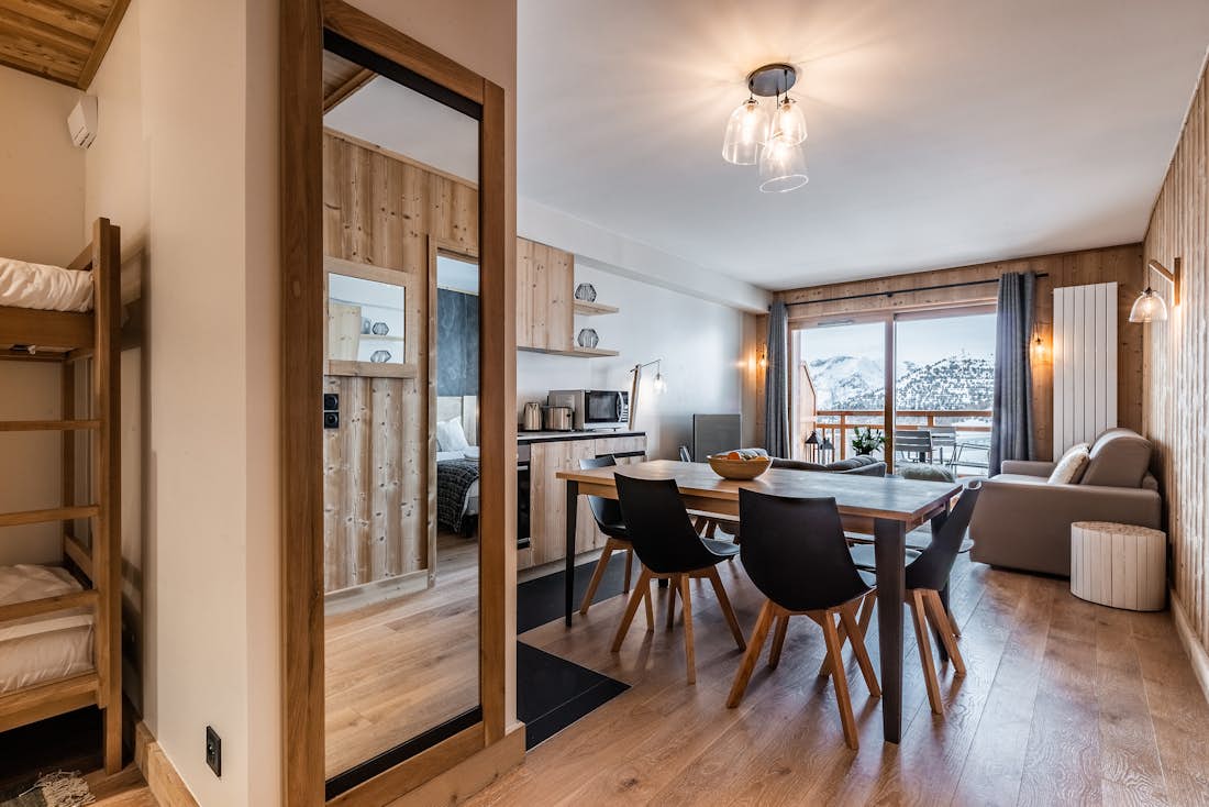 Modern dining room luxury ski in ski out apartment Thuja Alpe d'Huez