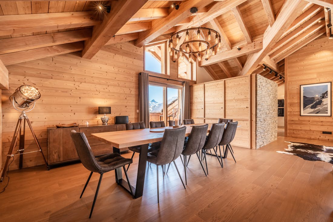 Bright open plan dining room outdoor views ski in ski out apartment Tamboti Alpe d'Huez