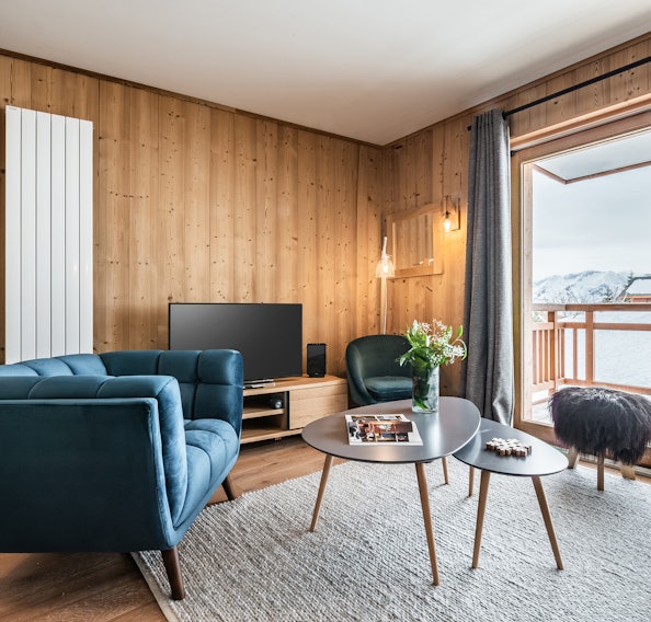 Alpine living room luxury ski in ski out apartment Sorbus Alpe d'Huez
