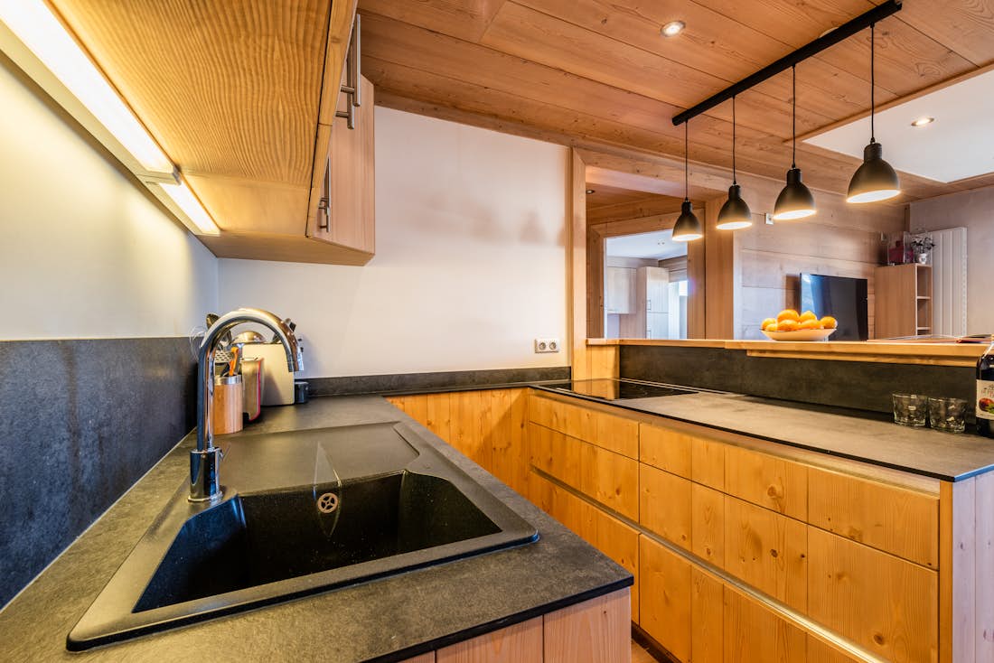 Bright open kitchen in ski out apartment Itauba Courchevel 1850