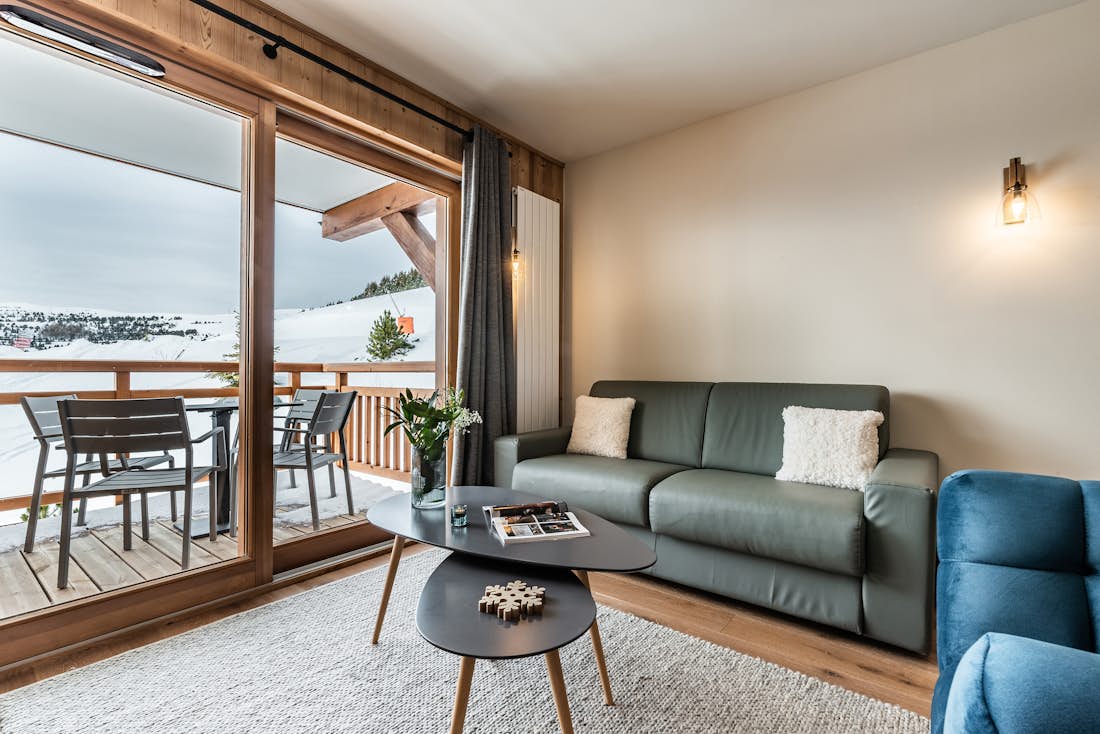 Salon moderne appartement de luxe aux pieds des pistes Juglans Alpe d'Huez